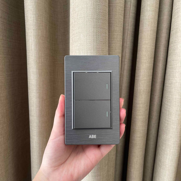 Công tắc nhựa PC xám chữ nhật được làm từ nhựa Polycarbonate